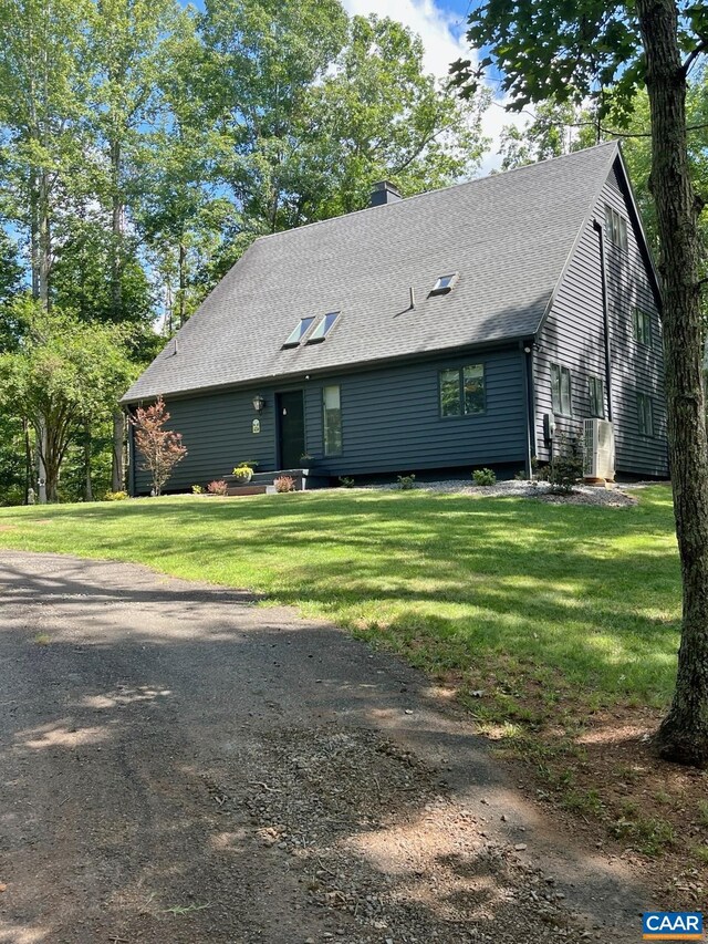 5875 Burnett Ln, Advance Mills, VA 22968 - back of property with a chimney, a lawn, a deck, and roof with shingles