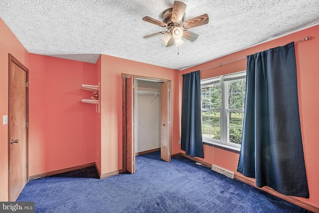 3716 Martin Kings Rd, Charlottesville, VA 22902 - unfurnished bedroom with carpet flooring, a closet, a textured ceiling, and ceiling fan