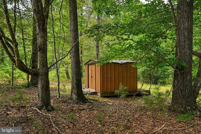 3716 Martin Kings Rd, Charlottesville, VA 22902 - view of yard featuring a shed and a wooded view