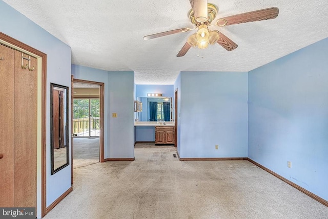 3716 Martin Kings Rd, Charlottesville, VA 22902 - unfurnished bedroom featuring a textured ceiling, carpet flooring, ceiling fan, and ensuite bathroom
