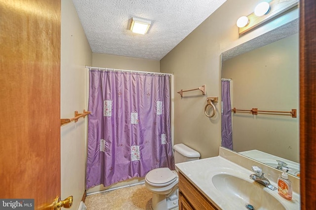 3716 Martin Kings Rd, Charlottesville, VA 22902 - bathroom featuring vanity, a textured ceiling, and shower / tub combo