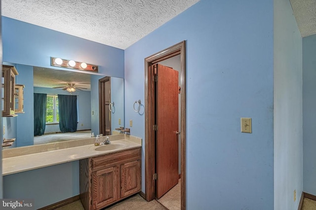 3716 Martin Kings Rd, Charlottesville, VA 22902 - bathroom featuring a textured ceiling, vanity, and ceiling fan