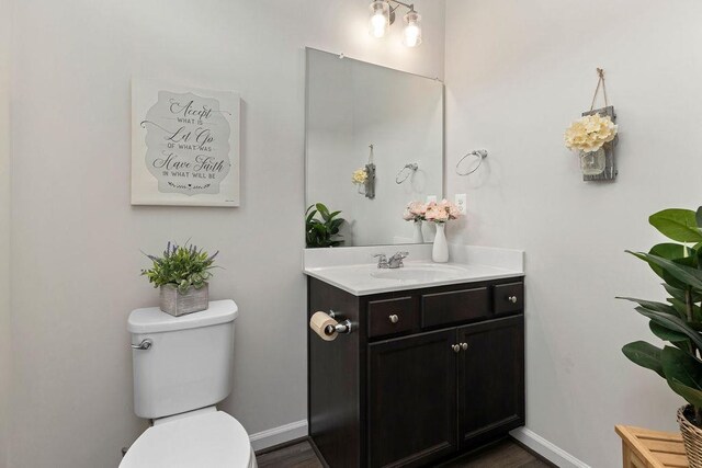 301 Willowshire Ct, Waynesboro, VA 22980 - half bath with vanity and wood finished floors