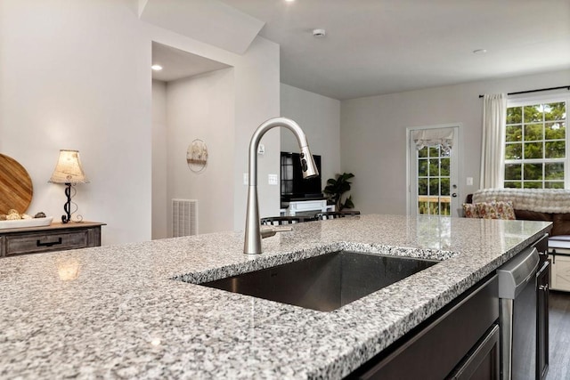 301 Willowshire Ct, Waynesboro, VA 22980 - kitchen with light stone countertops, wood finished floors, and open floor plan
