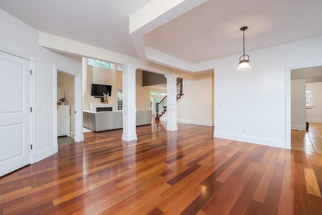 109 Leavel Ct, Bridgewater, VA 22812 - unfurnished living room with hardwood / wood-style flooring, decorative columns, baseboards, and a fireplace