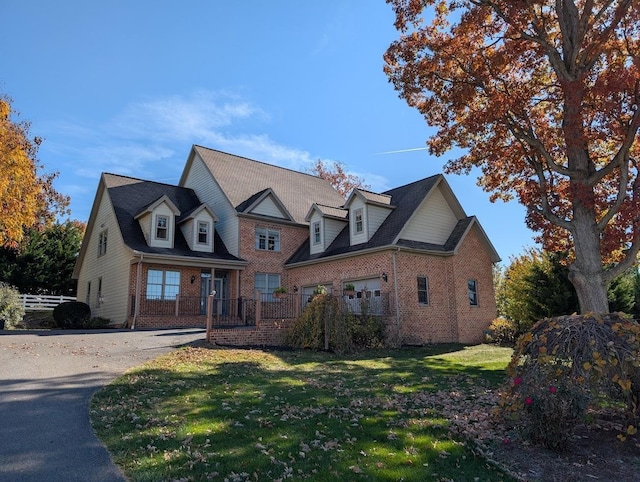 109 Leavel Ct, Bridgewater, VA 22812 - view of front facade with brick siding, a front yard, and asphalt driveway