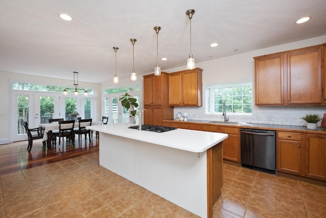 109 Leavel Ct, Bridgewater, VA 22812 - kitchen featuring dishwasher, a sink, brown cabinetry, gas stovetop, and recessed lighting