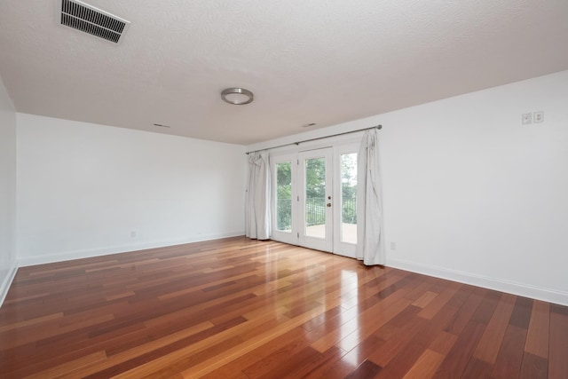109 Leavel Ct, Bridgewater, VA 22812 - spare room with wood finished floors, baseboards, and a textured ceiling