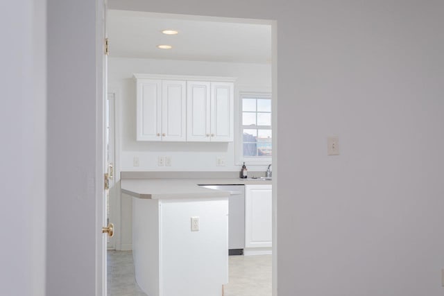 kitchen with white cabinets and dishwasher