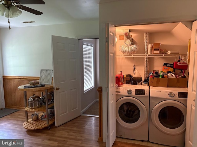 319 Fox Hunters Ln, Madison, VA 22727 - washroom featuring washer and clothes dryer, wood finished floors, a wainscoted wall, and a ceiling fan