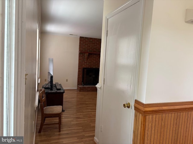 319 Fox Hunters Ln, Madison, VA 22727 - hallway with wood finished floors and a wainscoted wall