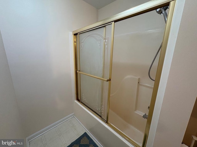 319 Fox Hunters Ln, Madison, VA 22727 - bathroom featuring enclosed tub / shower combo, tile patterned floors, and baseboards
