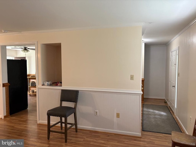 319 Fox Hunters Ln, Madison, VA 22727 - hall featuring crown molding, wood finished floors, and wainscoting