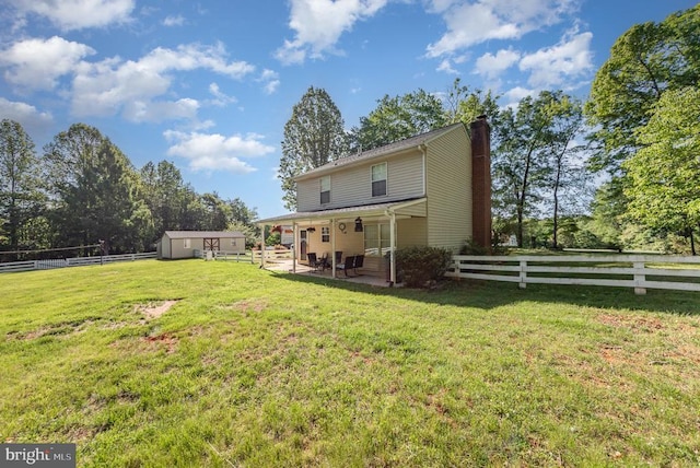 319 Fox Hunters Ln, Madison, VA 22727 - rear view of property featuring a chimney and a patio area