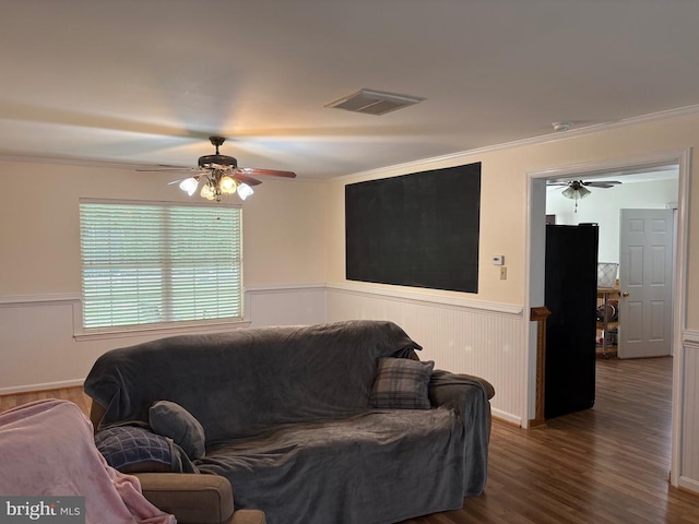 319 Fox Hunters Ln, Madison, VA 22727 - living area with ceiling fan, crown molding, a wainscoted wall, and wood finished floors