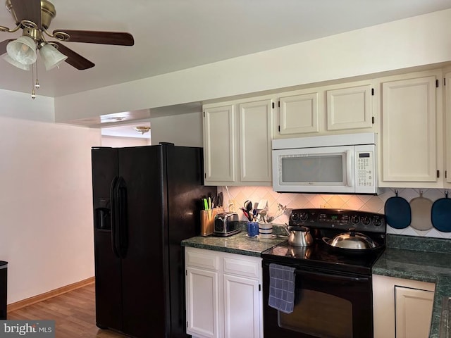 319 Fox Hunters Ln, Madison, VA 22727 - kitchen with black appliances, dark countertops, tasteful backsplash, ceiling fan, and wood finished floors
