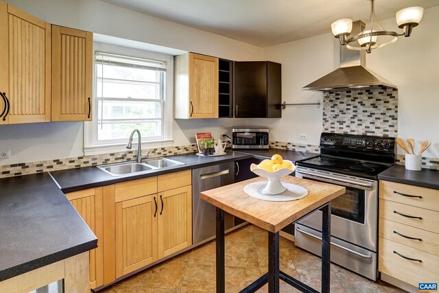 807 Hillcrest Rd, Charlottesville, VA 22903 - kitchen featuring appliances with stainless steel finishes, light brown cabinetry, a sink, and dark countertops