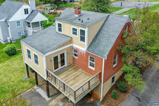 807 Hillcrest Rd, Charlottesville, VA 22903 - rear view of house featuring a shingled roof, french doors, a chimney, and a lawn