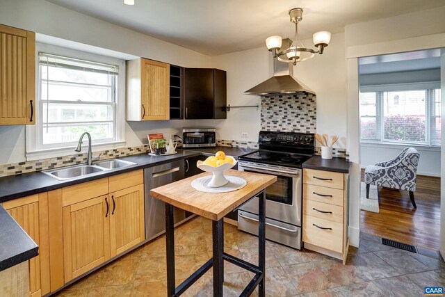 807 Hillcrest Rd, Charlottesville, VA 22903 - kitchen with appliances with stainless steel finishes, a sink, dark countertops, and light brown cabinets