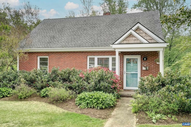807 Hillcrest Rd, Charlottesville, VA 22903 - view of front of property with roof with shingles, brick siding, and a chimney