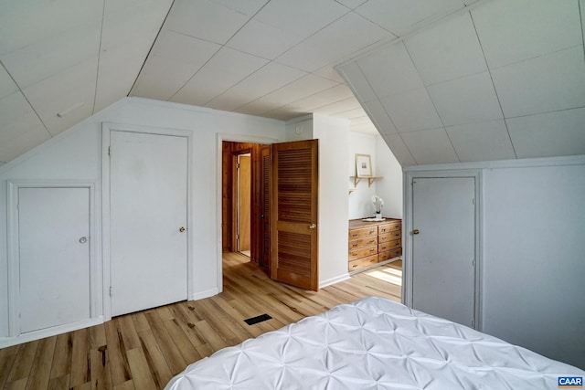 807 Hillcrest Rd, Charlottesville, VA 22903 - bedroom featuring wood finished floors and vaulted ceiling