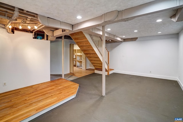 807 Hillcrest Rd, Charlottesville, VA 22903 - finished below grade area featuring stairway, baseboards, and recessed lighting