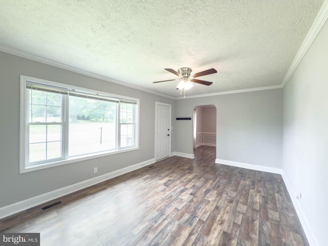 20497 Constitution Hwy, Orange, VA 22960 - unfurnished living room with wood finished floors, arched walkways, ceiling fan, a textured ceiling, and crown molding