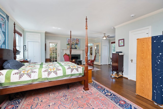 1204 Westmoreland Dr, Staunton, VA 24401 - bedroom with wood finished floors, multiple windows, ornamental molding, a lit fireplace, and baseboards