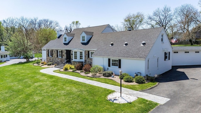 1204 Westmoreland Dr, Staunton, VA 24401 - cape cod-style house with a chimney, an outdoor structure, a front yard, and roof with shingles