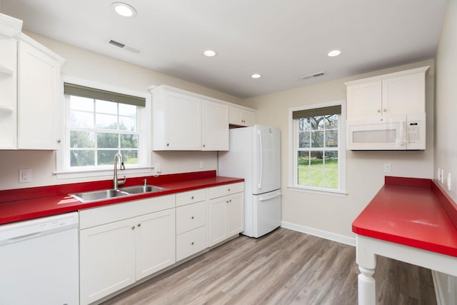 1204 Westmoreland Dr, Staunton, VA 24401 - kitchen with white appliances, a sink, white cabinetry, and recessed lighting