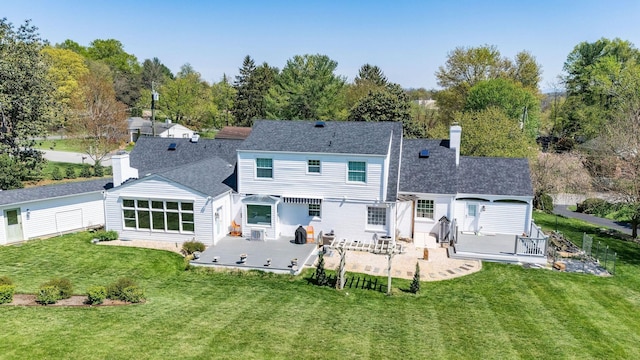 1204 Westmoreland Dr, Staunton, VA 24401 - rear view of property with a patio, a chimney, a lawn, and a shingled roof