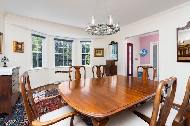 1204 Westmoreland Dr, Staunton, VA 24401 - dining space with radiator heating unit, a chandelier, healthy amount of natural light, crown molding, and dark wood finished floors