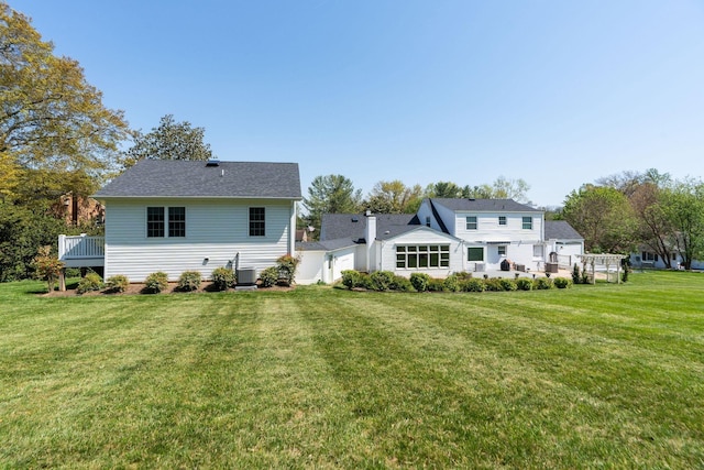 1204 Westmoreland Dr, Staunton, VA 24401 - rear view of property with a lawn, central AC, and a wooden deck