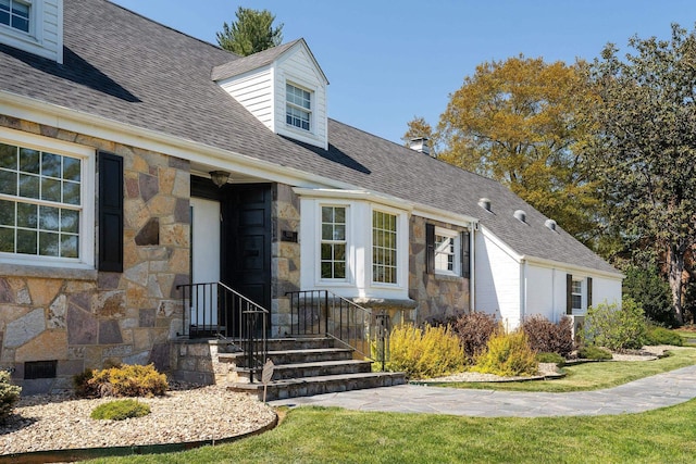 1204 Westmoreland Dr, Staunton, VA 24401 - doorway to property featuring stone siding, roof with shingles, and a lawn