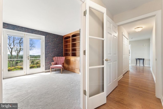 8300 Falcon Glen Rd, Warrenton, VA 20186 - unfurnished room with wallpapered walls, wood finished floors, and baseboards