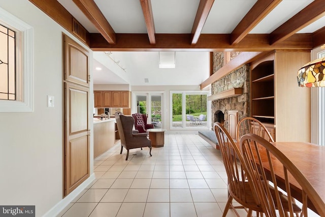 8300 Falcon Glen Rd, Warrenton, VA 20186 - interior space featuring built in shelves, light tile patterned flooring, a stone fireplace, and beam ceiling