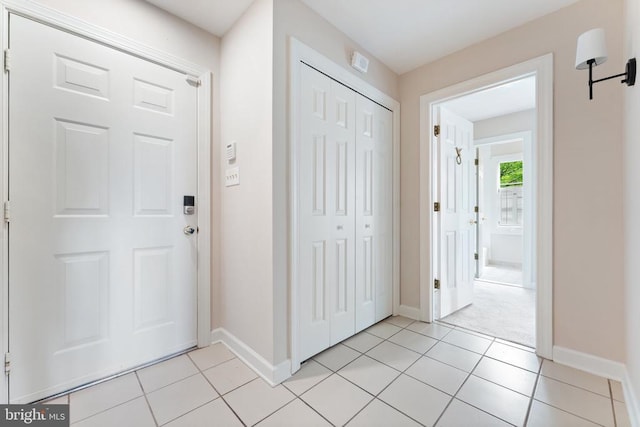 8300 Falcon Glen Rd, Warrenton, VA 20186 - foyer with light tile patterned floors and baseboards