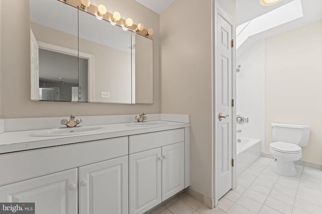 8300 Falcon Glen Rd, Warrenton, VA 20186 - bathroom with toilet, tile patterned floors, double vanity, and a sink