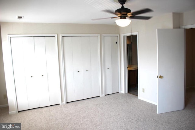 5151 Dominion Dr, Fredericksburg, VA 22407 - unfurnished bedroom featuring carpet flooring, two closets, visible vents, and baseboards