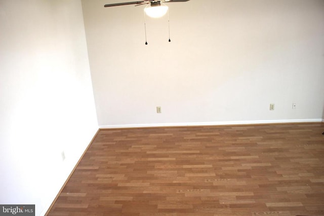 5151 Dominion Dr, Fredericksburg, VA 22407 - empty room with baseboards, wood finished floors, and a ceiling fan