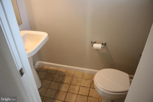 5151 Dominion Dr, Fredericksburg, VA 22407 - bathroom featuring toilet and baseboards