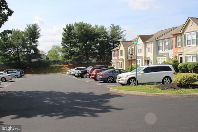 5151 Dominion Dr, Fredericksburg, VA 22407 - uncovered parking lot featuring a residential view
