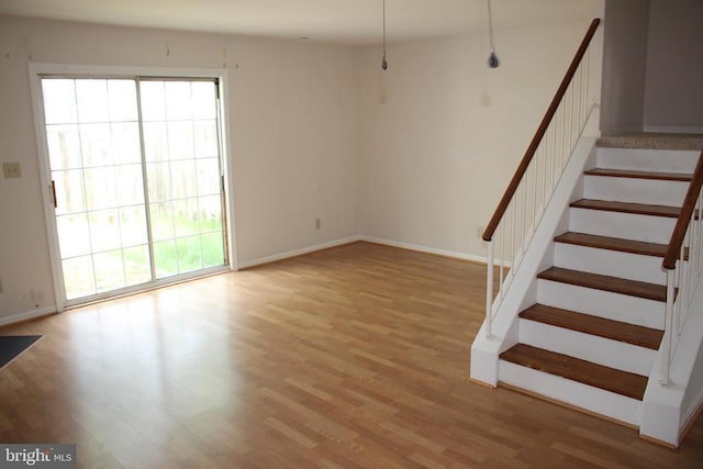 5151 Dominion Dr, Fredericksburg, VA 22407 - stairway featuring baseboards and wood finished floors