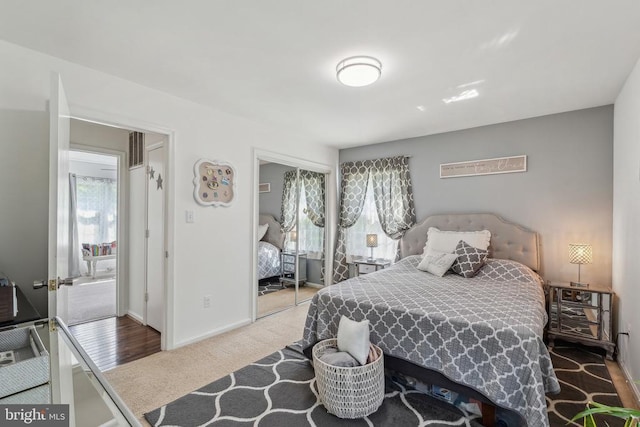  - bedroom featuring carpet floors and a closet