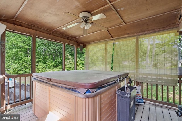  - deck with a hot tub and a ceiling fan