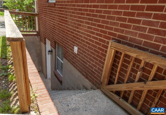 view of property exterior featuring brick siding