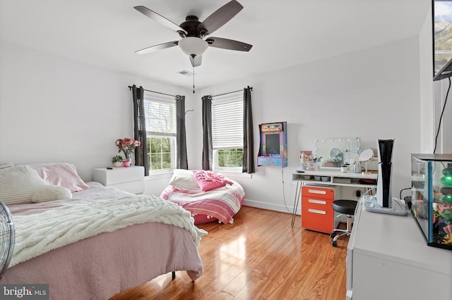 10314 Limestone Ave, Culpeper, VA 22701 - bedroom featuring light wood-style floors, baseboards, and a ceiling fan