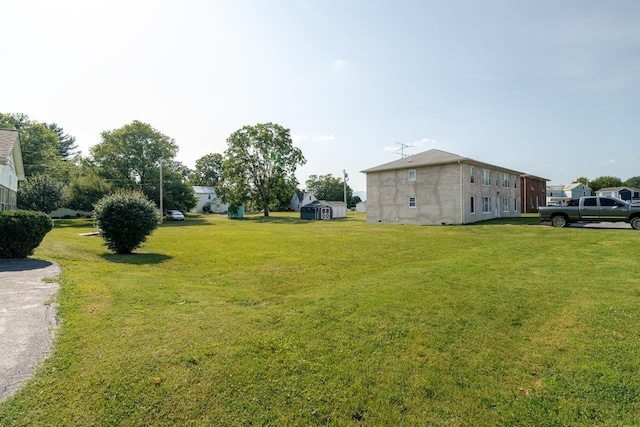205 Lewis Ave, Elkton, VA 22827 - view of grassy yard with a shed