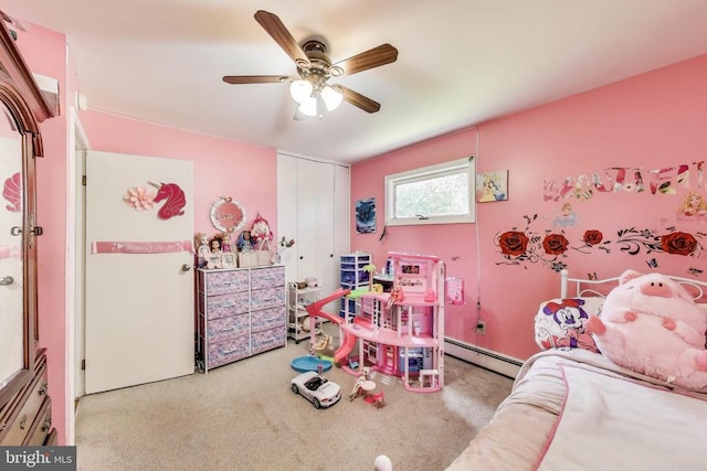 526 Azalea St, Culpeper, VA 22701 - carpeted bedroom with a baseboard heating unit, ceiling fan, and a closet