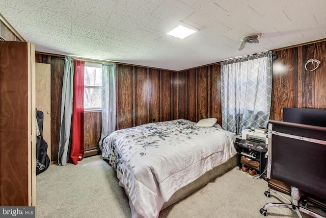 526 Azalea St, Culpeper, VA 22701 - bedroom featuring carpet, wood walls, and a baseboard radiator